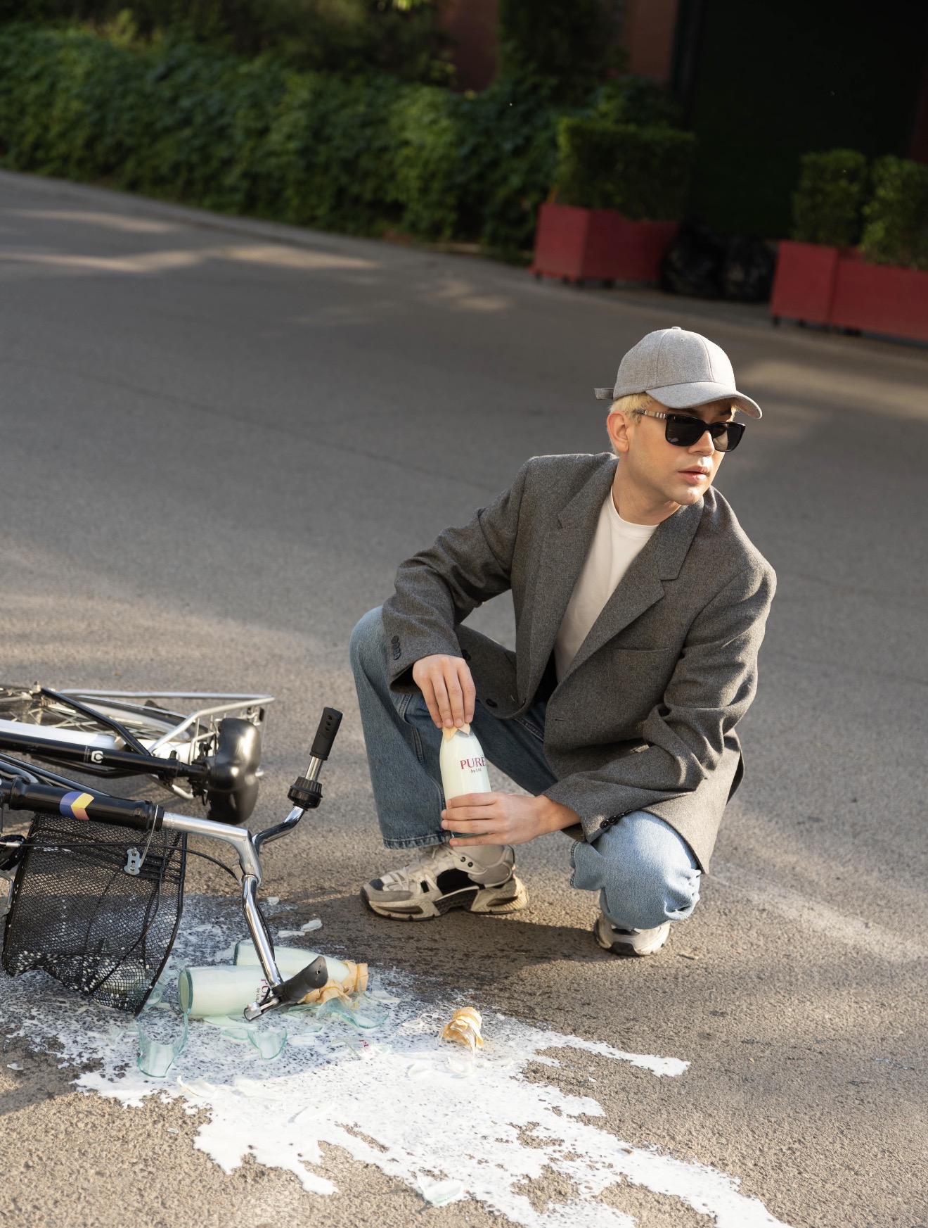 LiiL with PURÉ milk bottle and bicycle